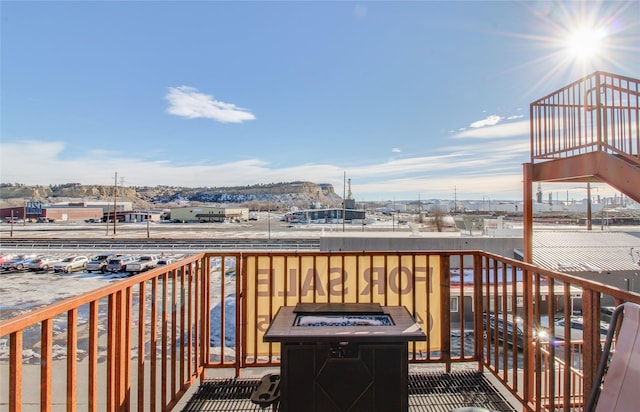 wooden deck featuring a water view