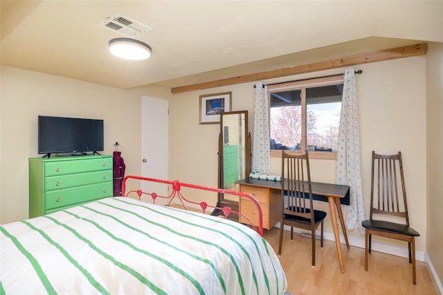 bedroom featuring light wood-type flooring