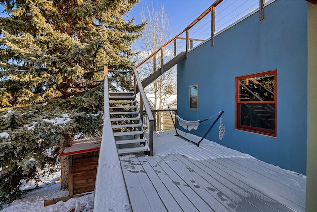 view of snow covered deck