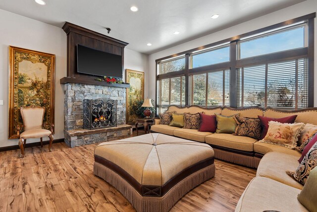 11 White Bark Ln, Kalispell, MT 59901 - living area with recessed lighting, light wood-type flooring, and a fireplace
