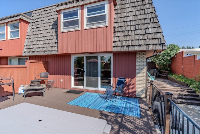 back of house featuring a patio