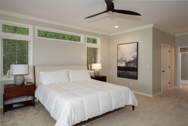 bedroom featuring ceiling fan, light colored carpet, and crown molding