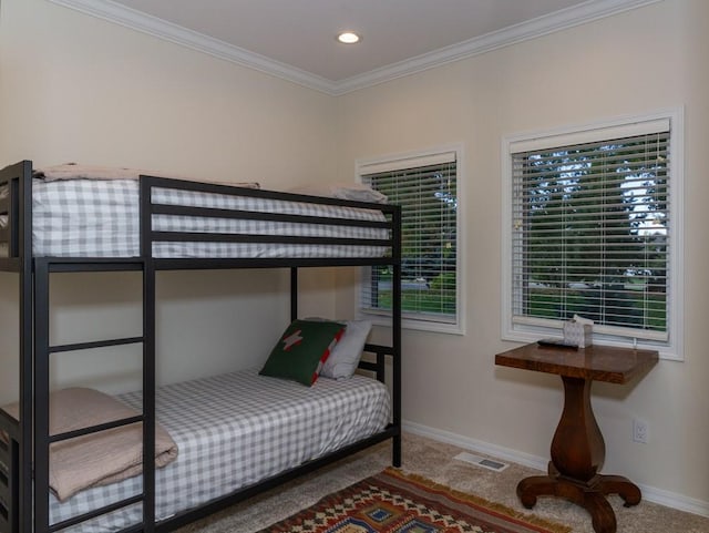 bedroom featuring carpet floors and ornamental molding