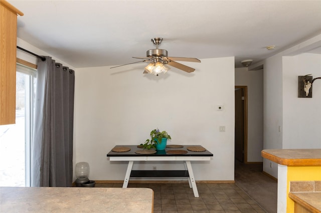 dining room with ceiling fan