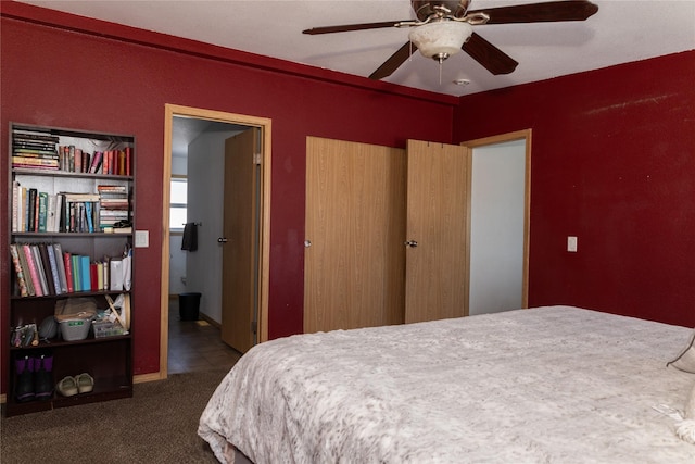 carpeted bedroom with ceiling fan