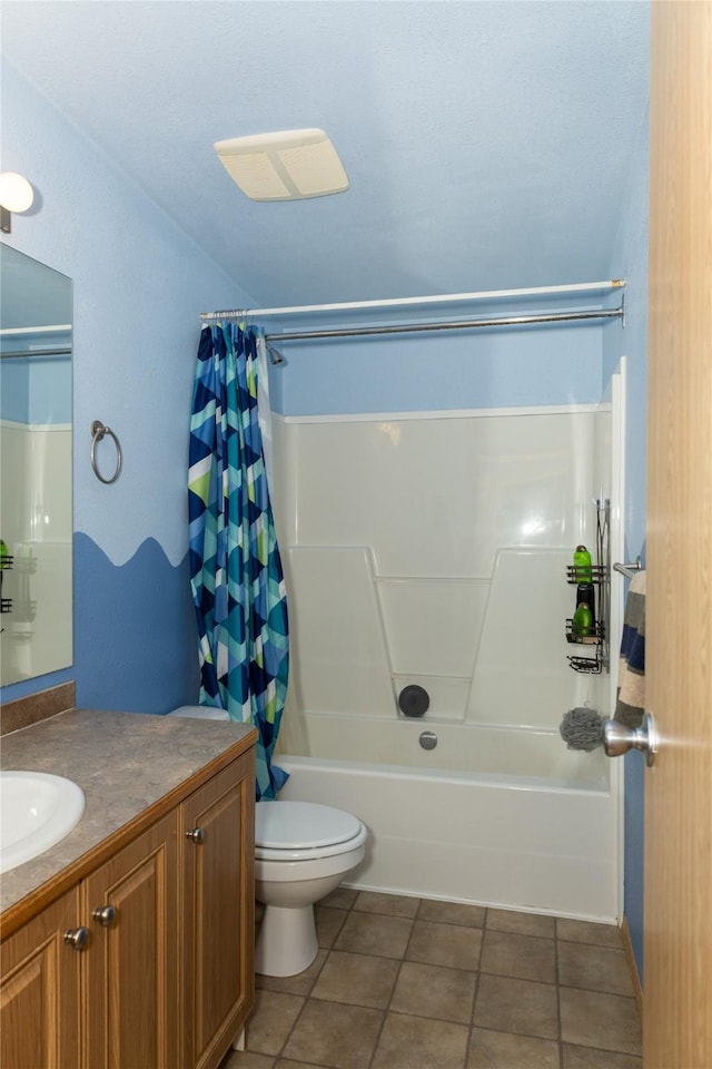 full bathroom with toilet, shower / tub combo, tile patterned floors, and vanity