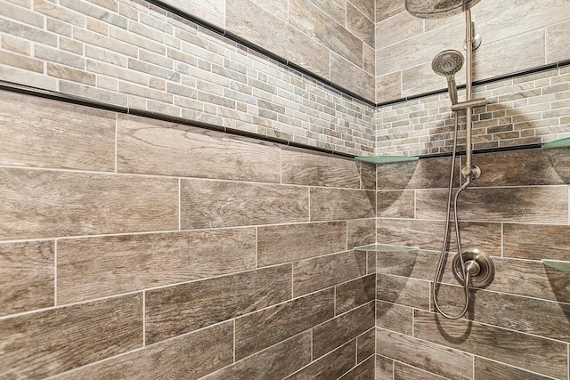 room details with a tile shower