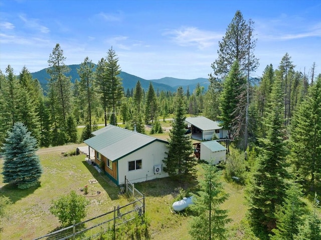 birds eye view of property featuring a mountain view