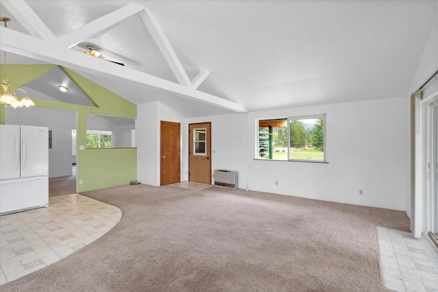 unfurnished living room with high vaulted ceiling, beamed ceiling, an inviting chandelier, heating unit, and light carpet