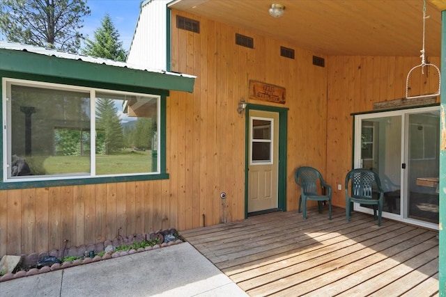 entrance to property featuring a deck