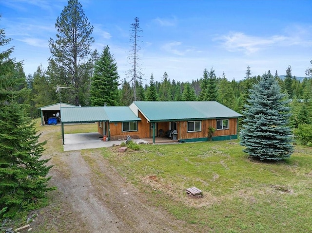 single story home featuring a porch and a front yard