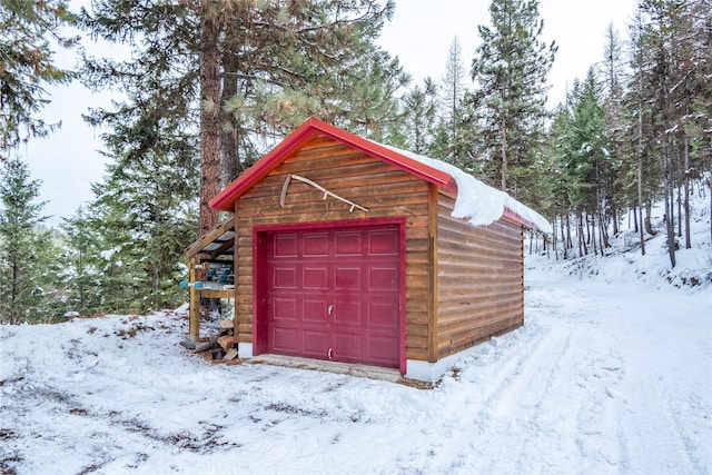 view of snow covered garage