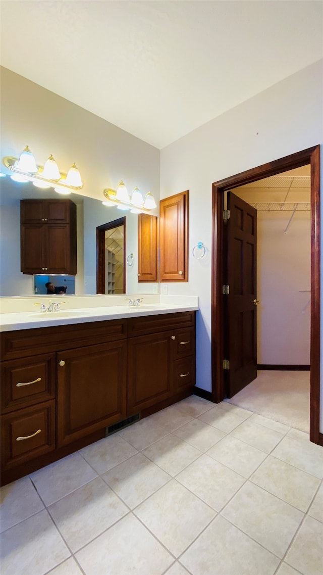 bathroom featuring vanity and tile patterned flooring