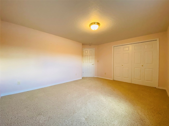 unfurnished bedroom featuring a closet