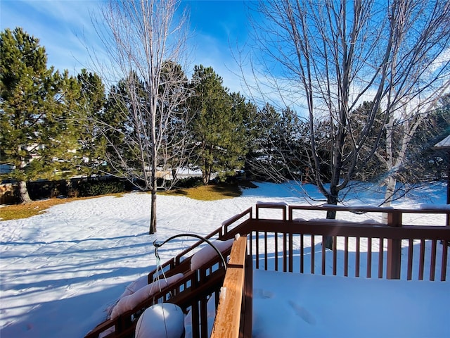 view of snow covered deck