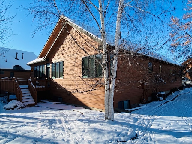 view of snow covered property