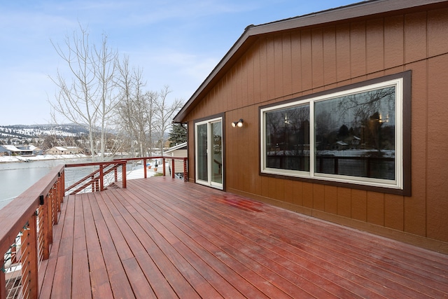 view of snow covered deck