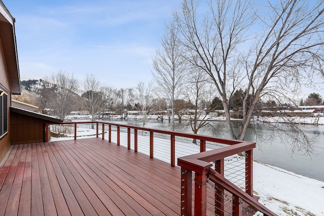 view of snow covered deck