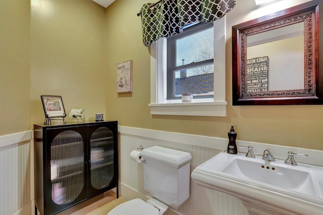 bathroom with sink and toilet