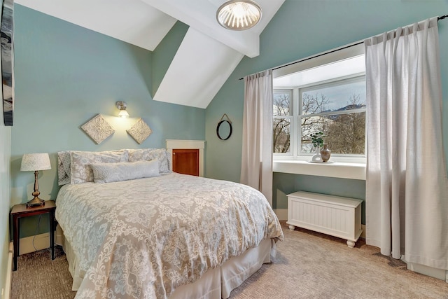 carpeted bedroom with radiator heating unit and vaulted ceiling