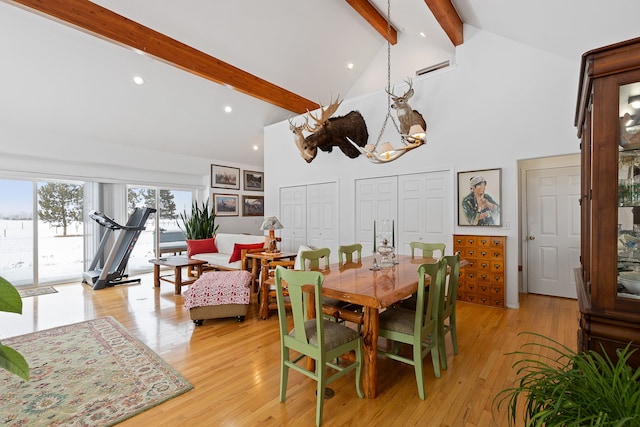 dining room with high vaulted ceiling, light hardwood / wood-style flooring, beamed ceiling, and a notable chandelier