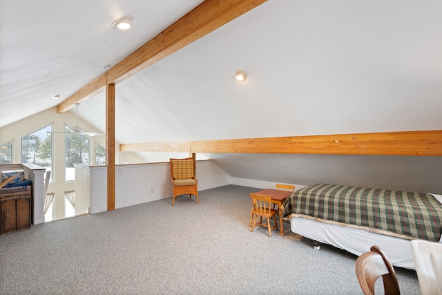 bedroom featuring vaulted ceiling with beams and carpet