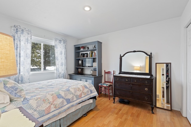 bedroom featuring light hardwood / wood-style flooring