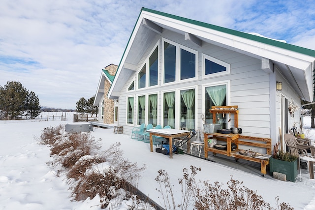 view of snow covered property