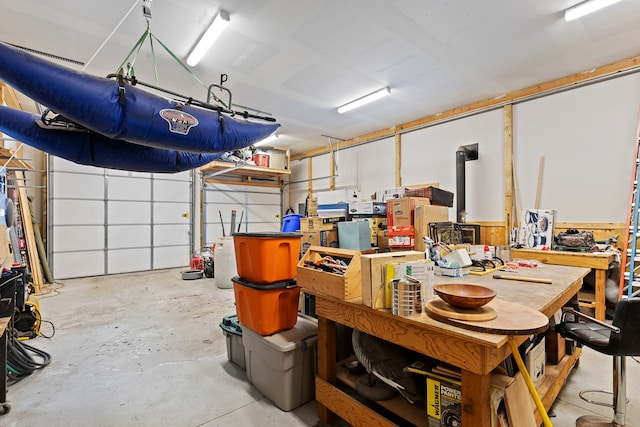 garage with a workshop area