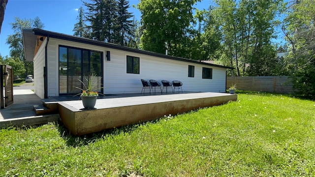 230 Fox Farm Dr, Whitefish, MT 59937 - rear view of house with a deck