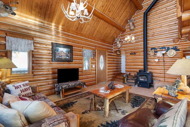 2122 Lightning Draw Trl, Victor, MT 59875 - tiled living room featuring a chandelier, a wood stove, wood ceiling with exposed beams, log walls, and high vaulted ceiling