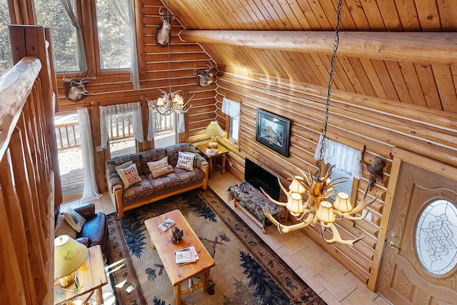 2122 Lightning Draw Trl, Victor, MT 59875 - tiled living area featuring rustic walls, wooden ceiling with exposed beams, a chandelier, and high vaulted ceiling