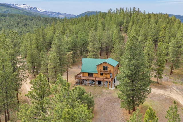 2122 Lightning Draw Trl, Victor, MT 59875 - view from above of property featuring a forest and a mountain backdrop