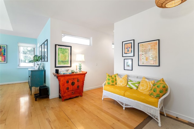 living area with light hardwood / wood-style floors