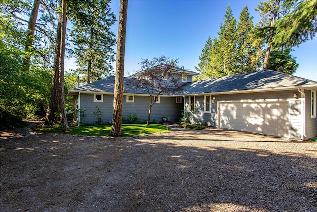 ranch-style home with a garage