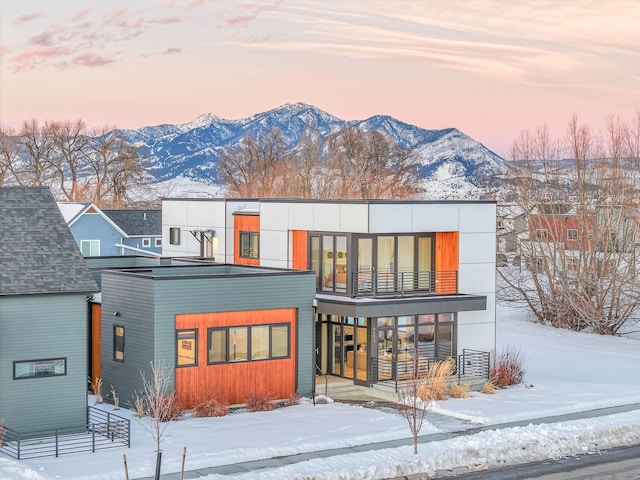 view of front of property with a mountain view