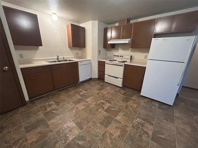 kitchen featuring sink, white appliances, dark brown cabinets, and a textured ceiling