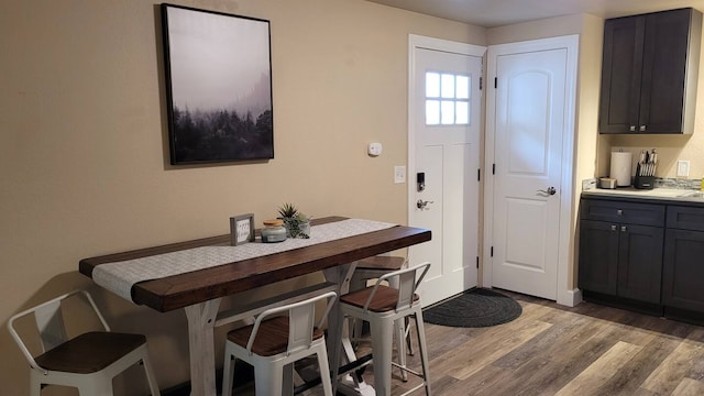 dining area featuring light wood-type flooring