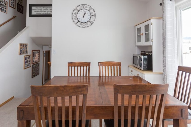 view of carpeted dining space