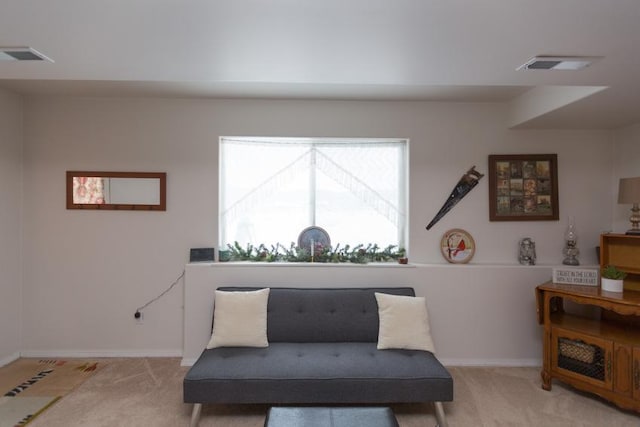 sitting room with light carpet