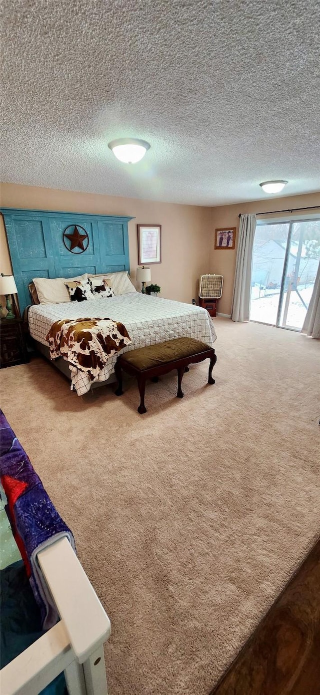 carpeted bedroom with a textured ceiling