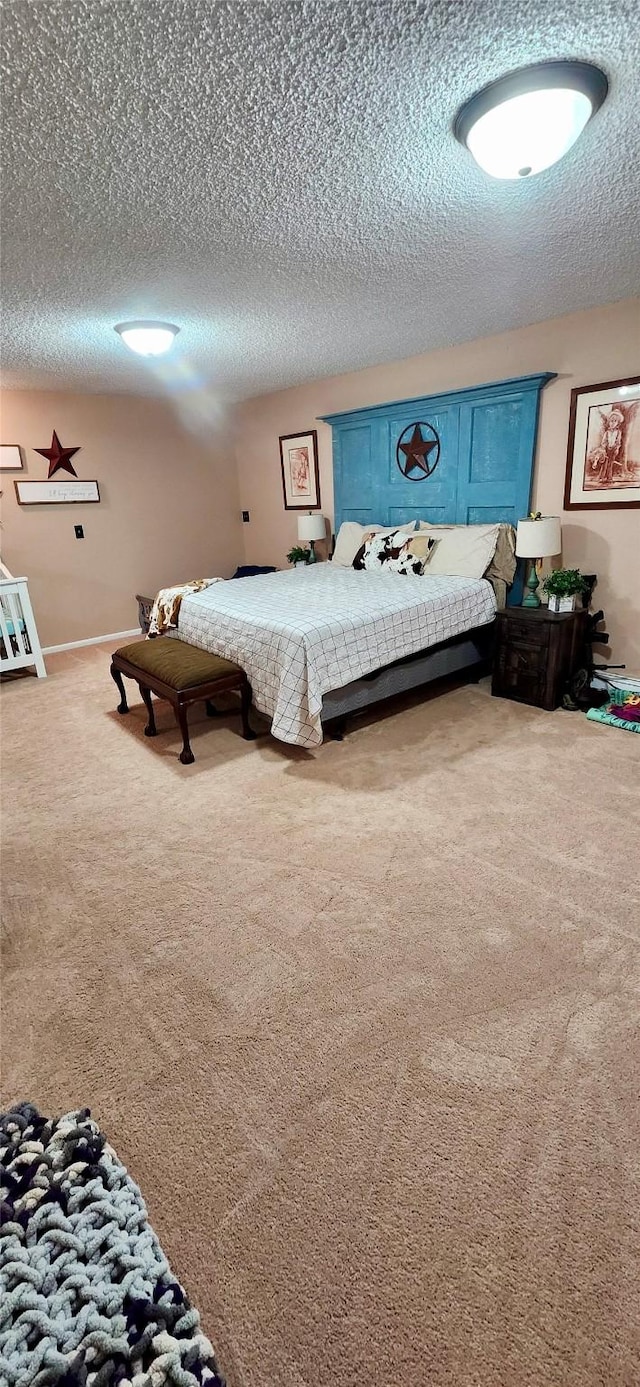 carpeted bedroom with a textured ceiling