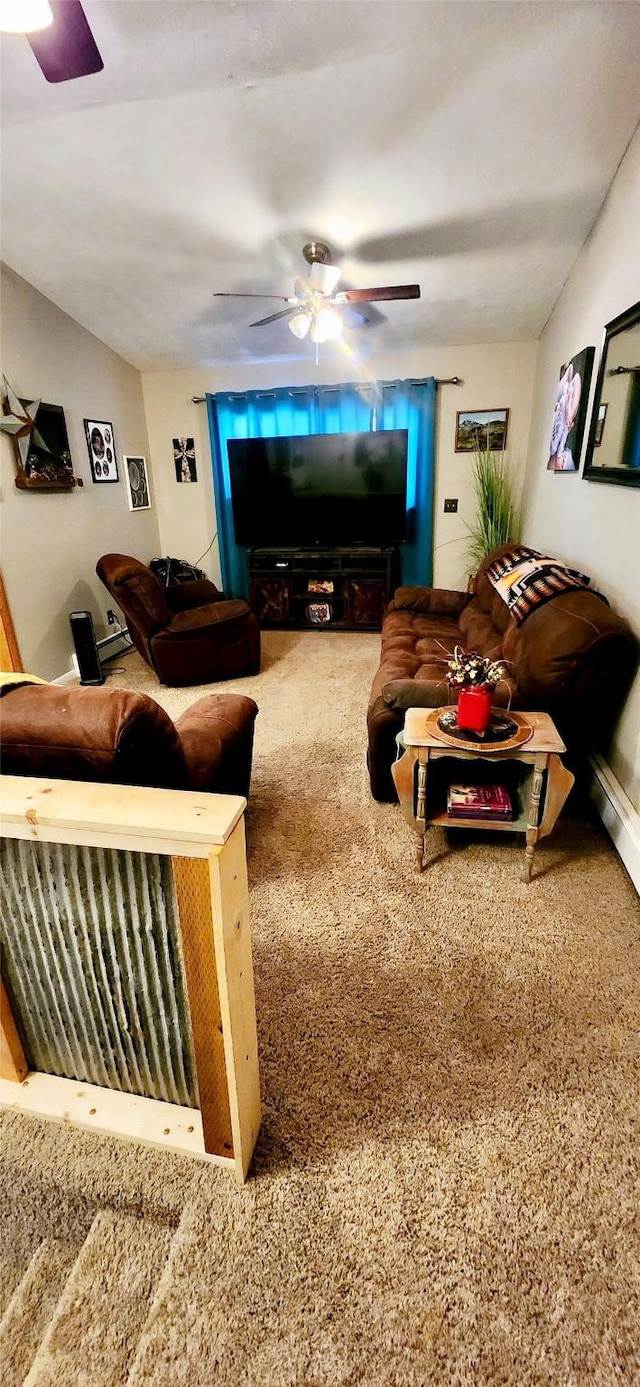 carpeted living room with ceiling fan