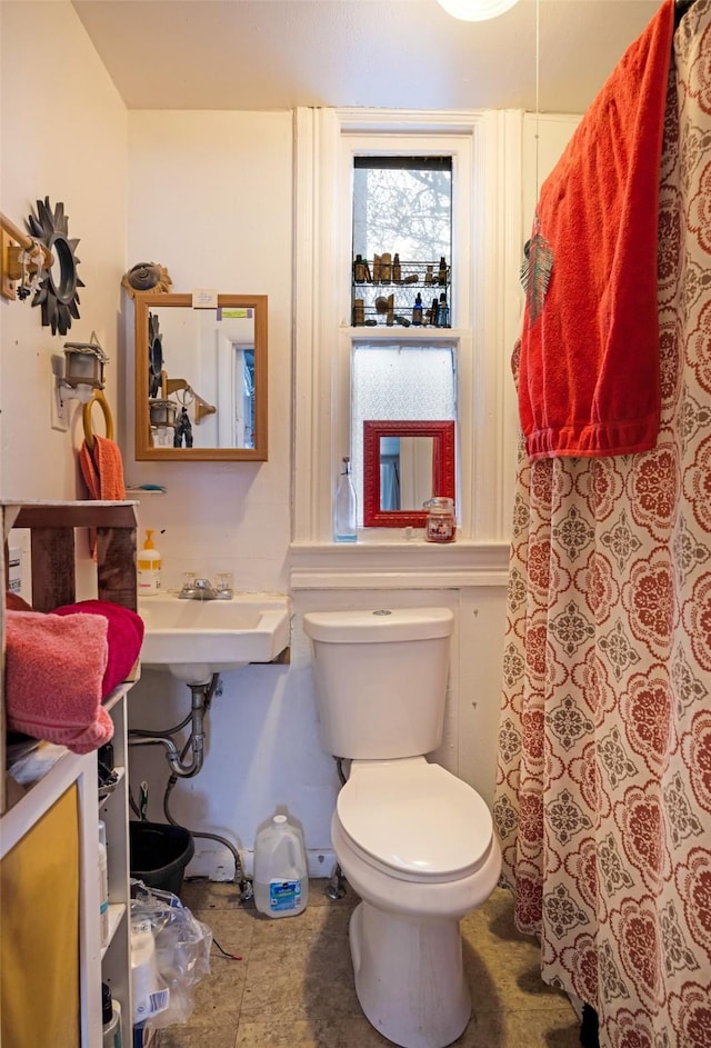 bathroom with sink and toilet