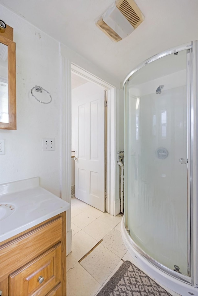 333 N 2nd St W, Missoula, MT 59802 - bathroom with a stall shower, vanity, and tile patterned floors