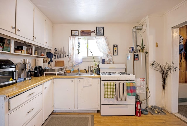 kitchen with crown molding, light hardwood / wood-style flooring, sink, white cabinetry, and white gas range oven