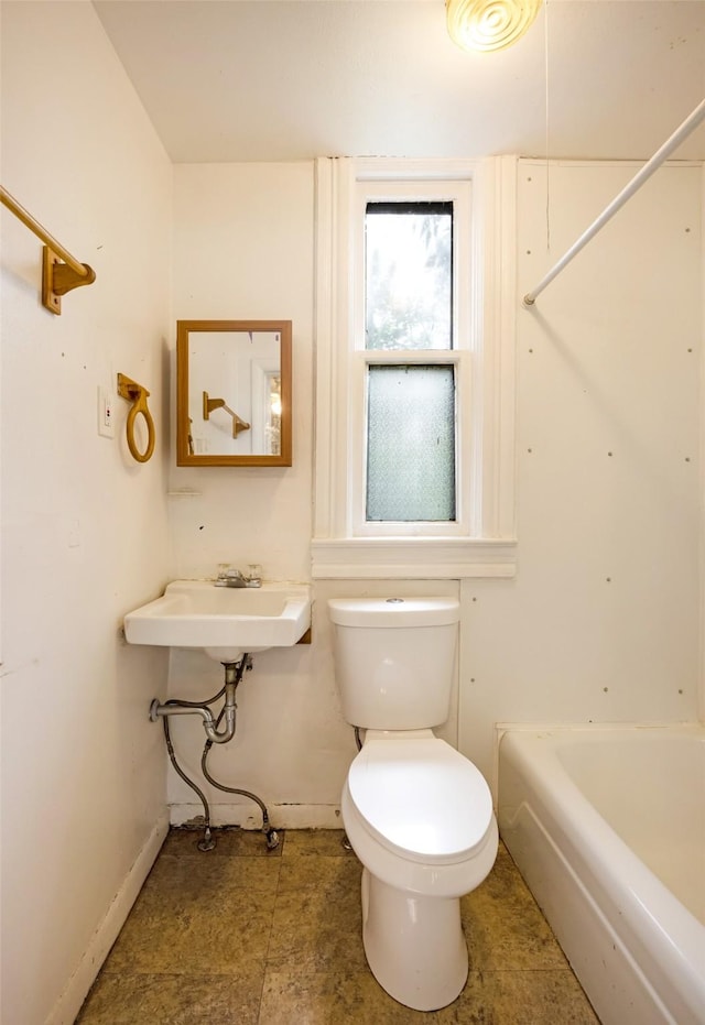 333 N 2nd St W, Missoula, MT 59802 - full bath featuring toilet, baseboards, a tub, and a shower