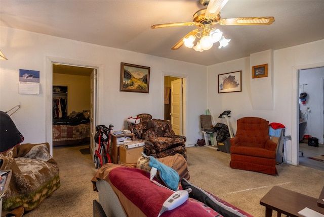 carpeted living room featuring ceiling fan