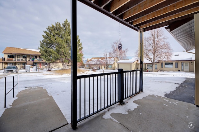 view of snow covered patio