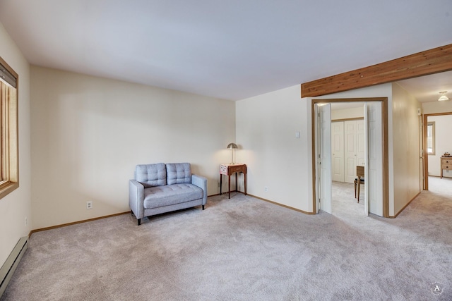 sitting room with beamed ceiling, light colored carpet, and baseboard heating